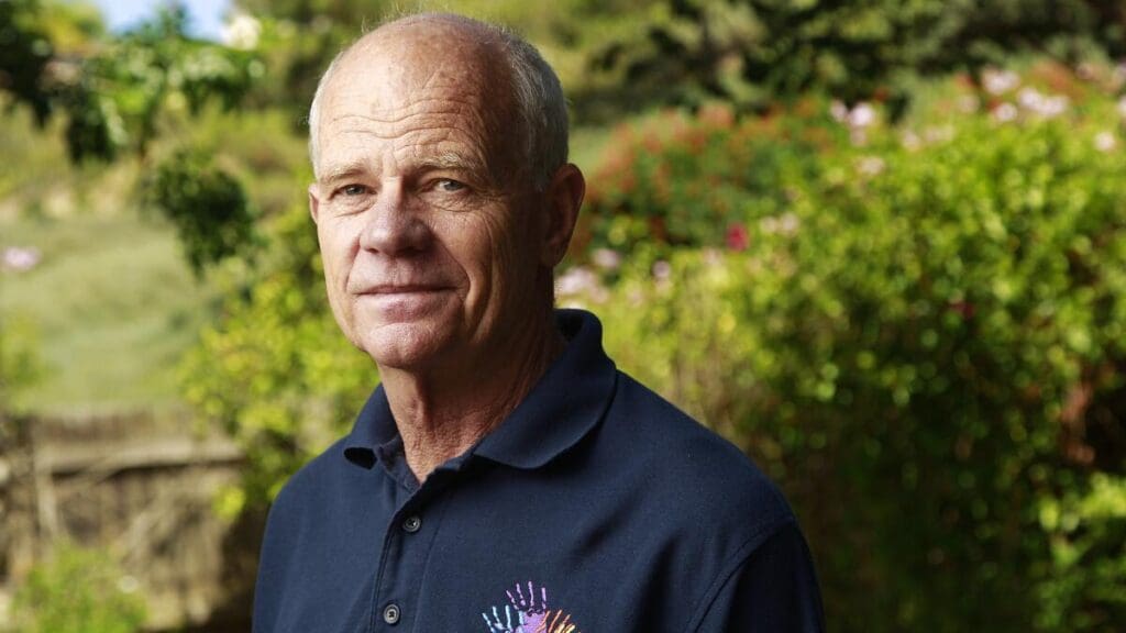 Byron Shewman, pictured at his Oceanside home, has given about $50,000 of his own money to help feed and educate Haitian children. K.C. Alfred • U-T